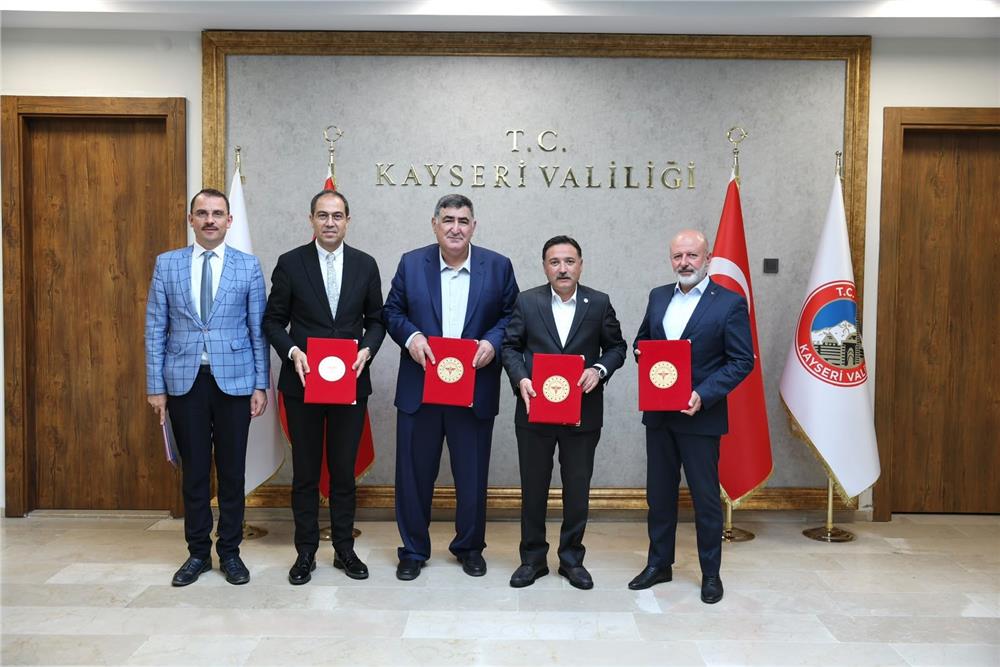 Valilikte iki protokol birden